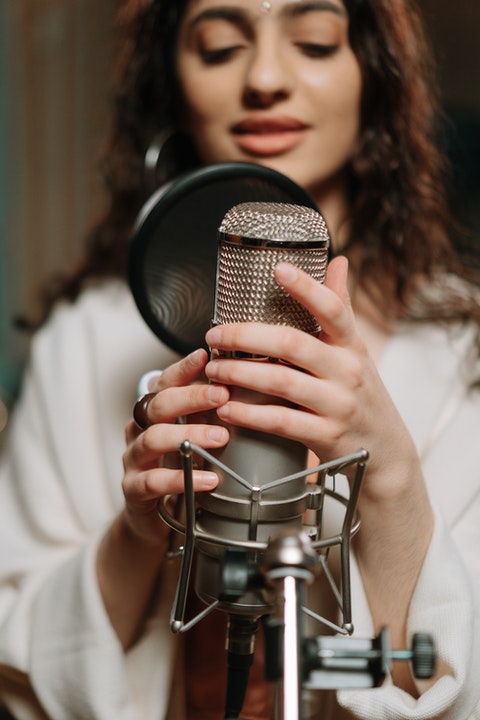 girl at microphone