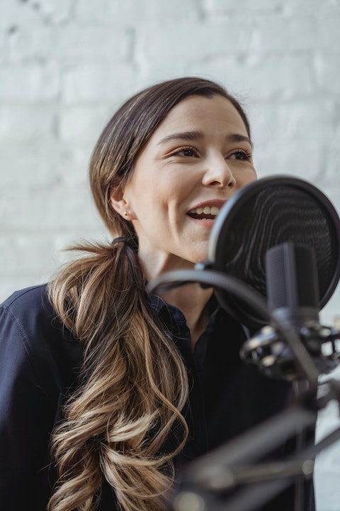 happy girl at microphone