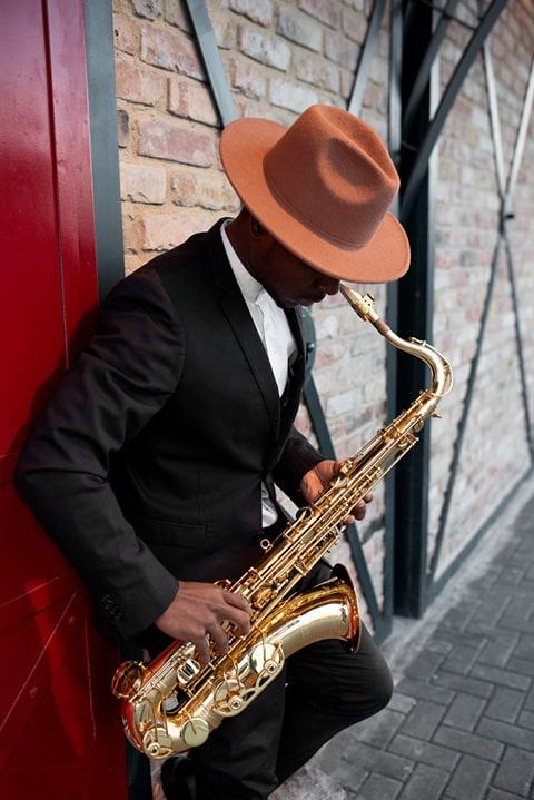 medium-shot-man-playing-saxophone
